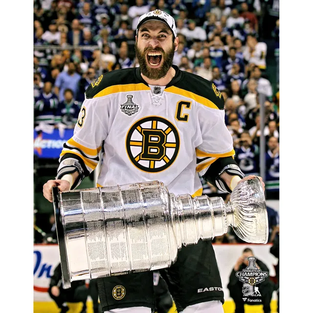 Patrice Bergeron Boston Bruins Unsigned 2011 Stanley Cup Champions Raising  Cup Photograph