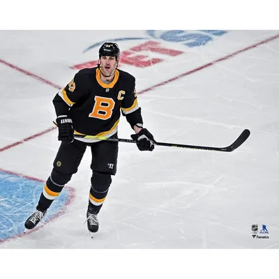 Brad Marchand Boston Bruins Unsigned Black Jersey Skating Photograph