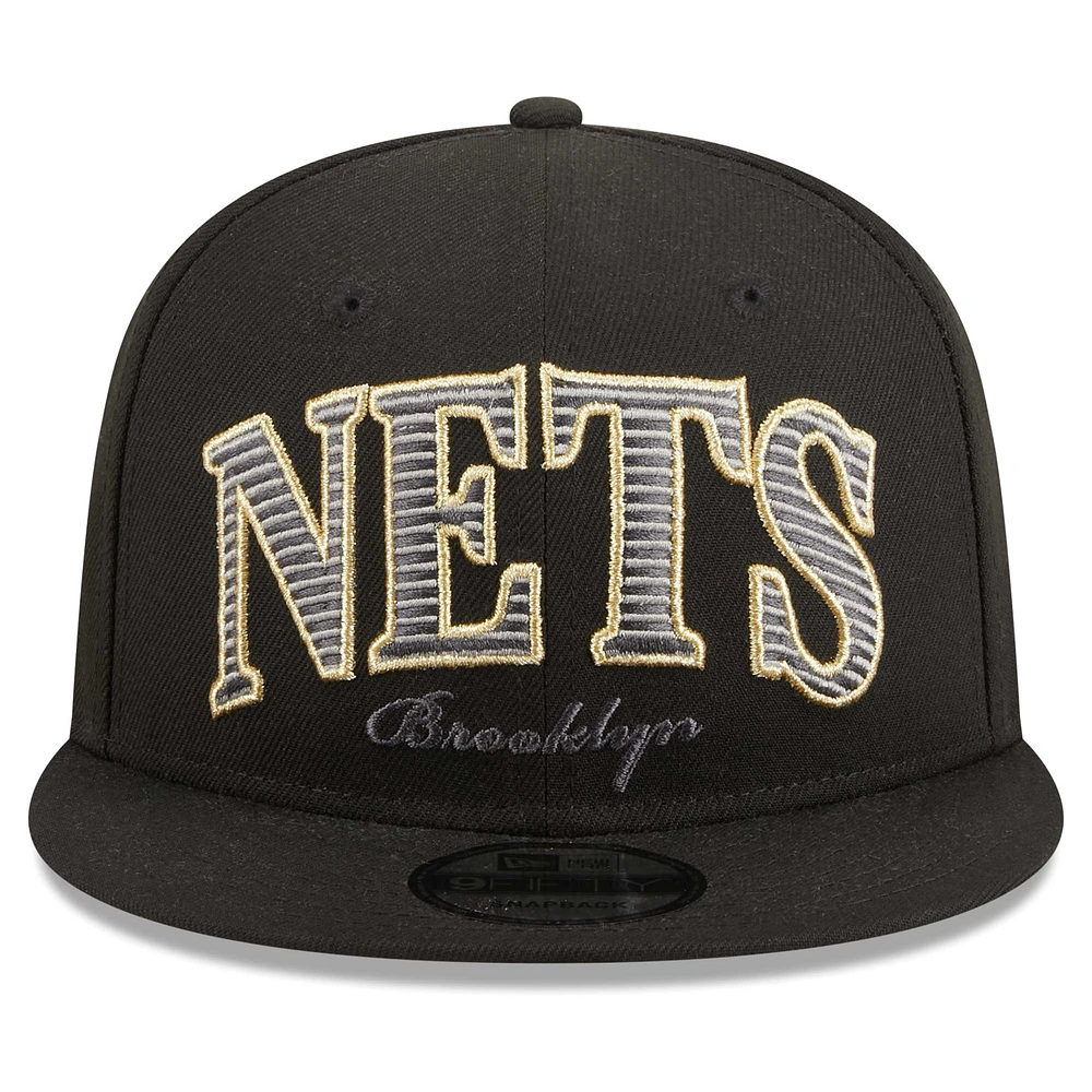 Men's New Era Black Brooklyn Nets Golden Tall Text 9FIFTY Snapback Hat