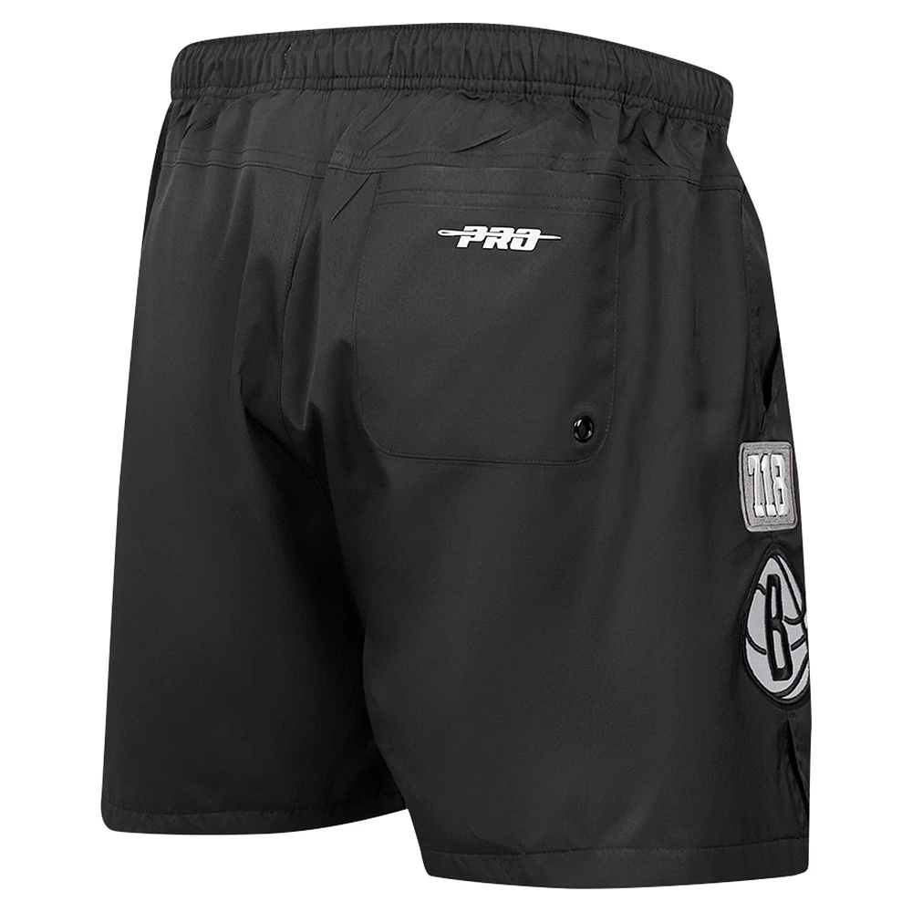 Short Pro Standard noir pour homme avec code régional des Brooklyn Nets