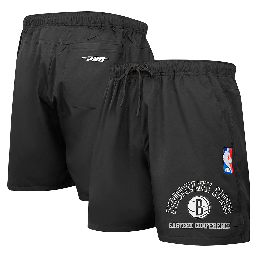 Short Pro Standard noir pour homme avec code régional des Brooklyn Nets