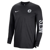 Maillot de tir unisexe Nike Brooklyn Nets 2023/24 authentique à manches longues d'avant-match noir