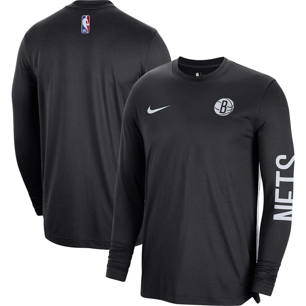 Maillot de tir unisexe Nike Brooklyn Nets 2023/24 authentique à manches longues d'avant-match noir