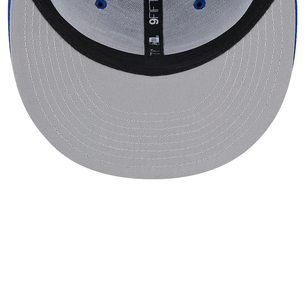 Men's New Era Royal Buffalo Bills Main Trucker 9FIFTY Snapback Hat