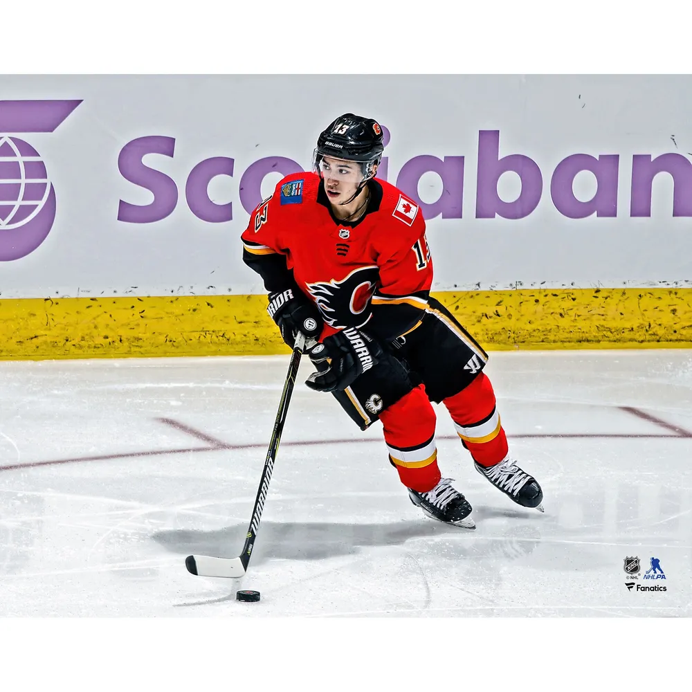 Johnny Gaudreau Calgary Flames Unsigned Red Jersey Skating Photograph