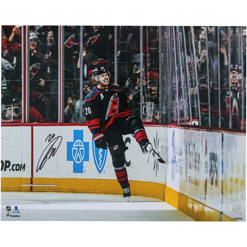 Sebastian Aho Carolina Hurricanes Autographed 16" x 20" Black Jersey Celebration Photograph