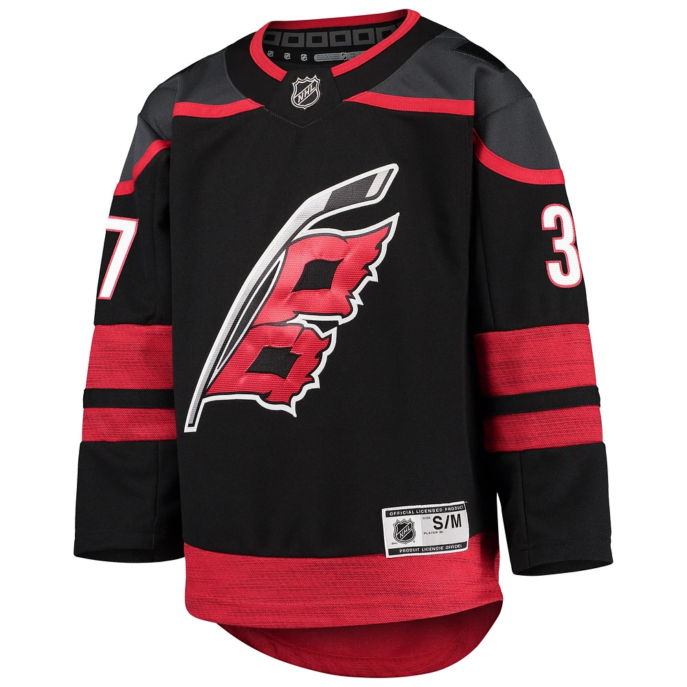 Maillot de joueur premier ministre à domicile des Hurricanes la Caroline noir Andrei Svechnikov pour jeunes