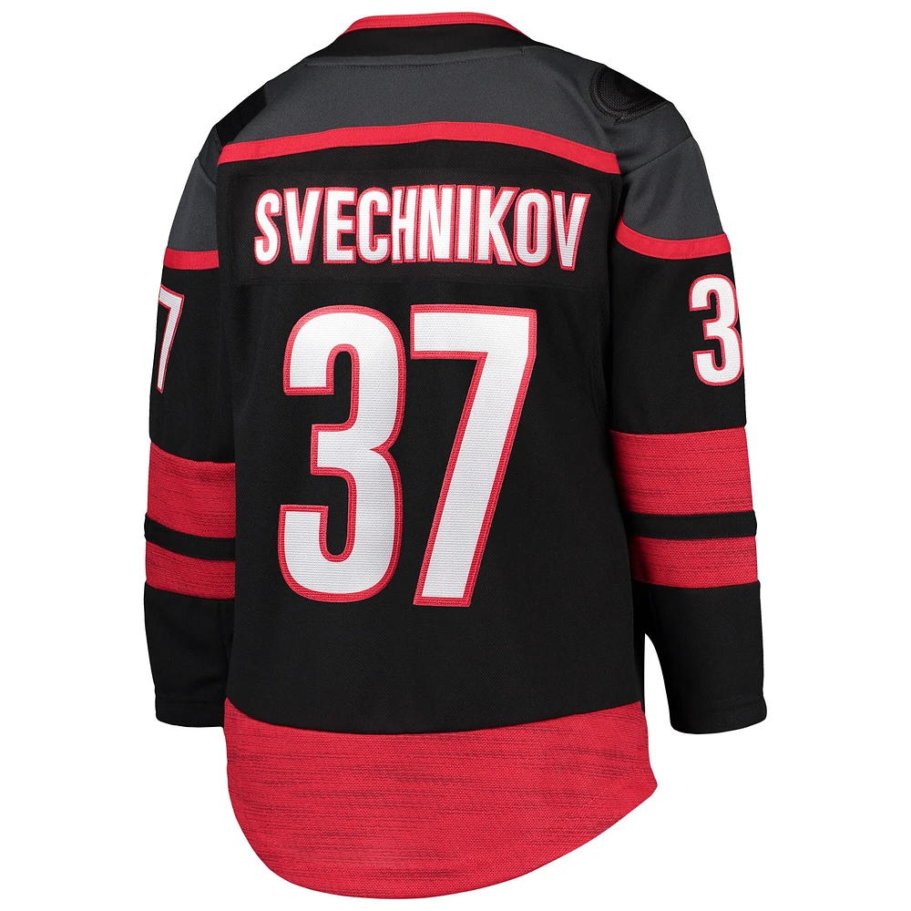 Maillot de joueur premier ministre à domicile des Hurricanes la Caroline noir Andrei Svechnikov pour jeunes