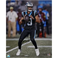 Bryce Young Carolina Panthers Autographed 16" x 20" Vertical Passing in Black Jersey Photograph 