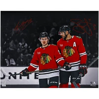 Connor Bedard & Seth Jones Chicago Blackhawks Autographed 16" x 20" Red Jersey Spotlight Photograph 