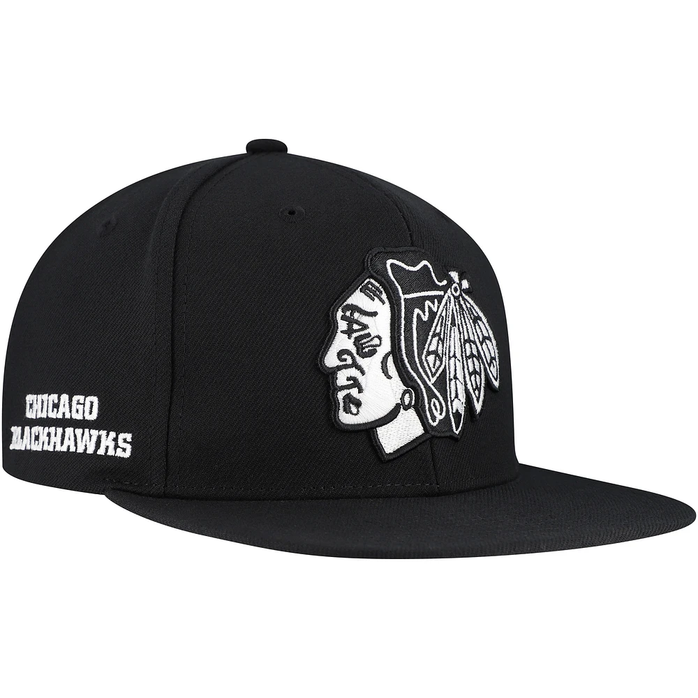 Casquette Snapback Mitchell & Ness noire pour homme des Chicago Blackhawks