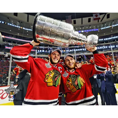 Patrick Kane & Jonathan Toews Chicago Blackhawks Fanatics Authentic Unsigned 2015 Stanley Cup Champions Raising Photograph