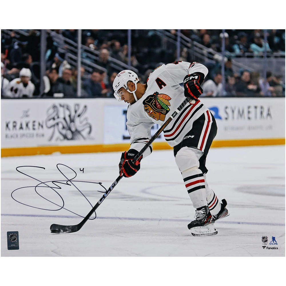 Seth Jones Chicago Blackhawks Autographed 16" x 20" White Jersey Shooting Photograph