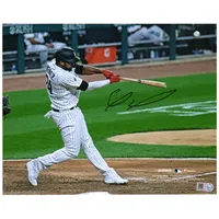 Eloy Jimenez Chicago White Sox Unsigned Hitting in Black Jersey Photograph