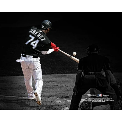 Eloy Jimenez Chicago White Sox Unsigned Hitting Black Jersey Photograph