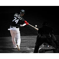 Eloy Jimenez Chicago White Sox Unsigned Hitting Black Jersey Photograph