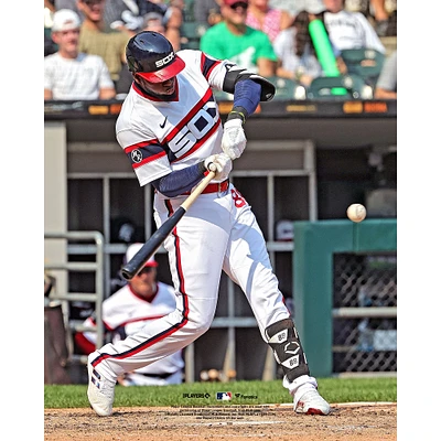 Luis Robert Chicago White Sox Unsigned Hits a Run Scoring Single Photograph
