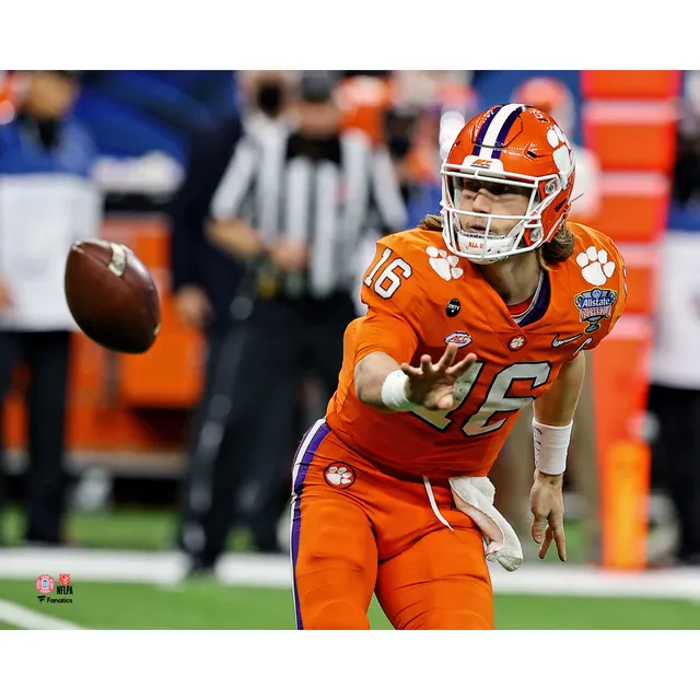 Trevor Lawrence Jacksonville Jaguars Unsigned White Jersey Scrambling  Photograph