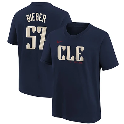 T-shirt Nike Shane Bieber pour jeunes Cleveland Guardians 2024 City Connect avec nom et numéro, bleu marine