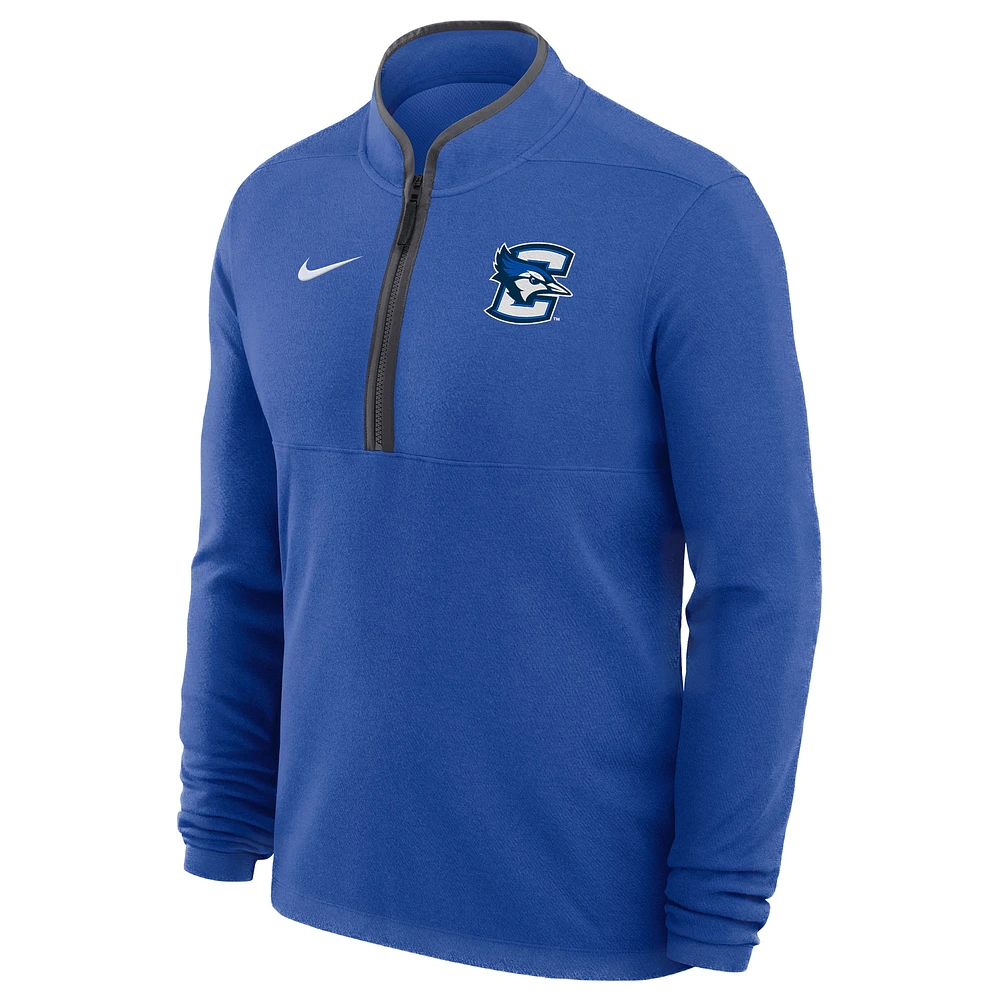 Haut Nike bleu à fermeture éclair quart de tour pour homme, entraîneur basket-ball Courtside Victory Performance des Creighton Bluejays