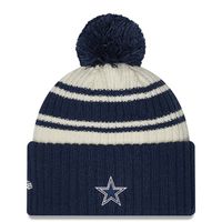 Youth New Era Cream/Navy Dallas Cowboys 2022 Sideline - Sport Cuffed Pom Knit Hat