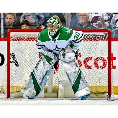 Corey Crawford Chicago Blackhawks Fanatics Authentic Unsigned White Jersey Playing Puck Photograph