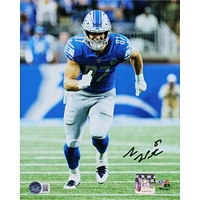 Photographie autographiée de Sam LaPorta des Lions de Détroit montrant son parcours de course en maillot bleu