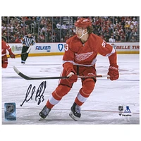 Moritz Seider Detroit Red Wings Autographed 8" x 10" Red Jersey Skating Photograph