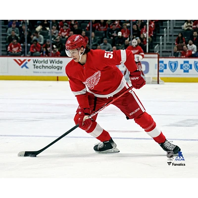 Moritz Seider Detroit Red Wings Unsigned Handling the Puck Photograph