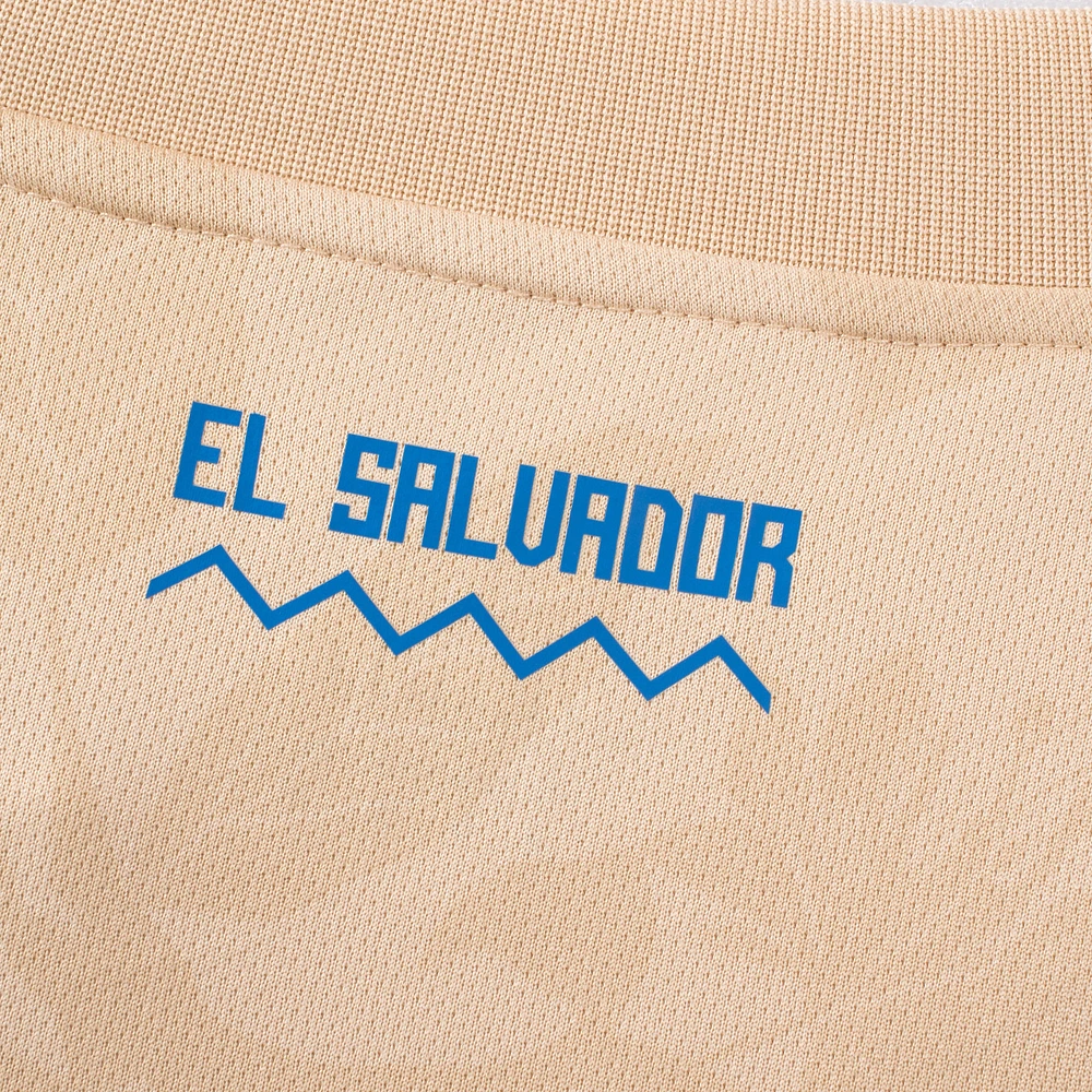 Maillot d'avant-match de l'équipe nationale Umbro Tan El Salvador 2025 pour hommes