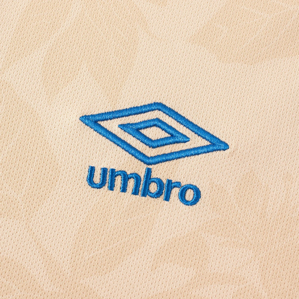 Maillot d'avant-match de l'équipe nationale Umbro Tan El Salvador 2025 pour hommes