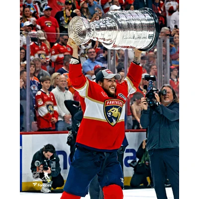 Brandon Montour Florida Panthers Unsigned 2024 Stanley Cup Champions Raising Photograph
