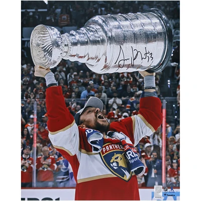 Sam Reinhart Florida Panthers Autographed 2024 Stanley Cup Champions 16" x 20" Raising Cup Photograph