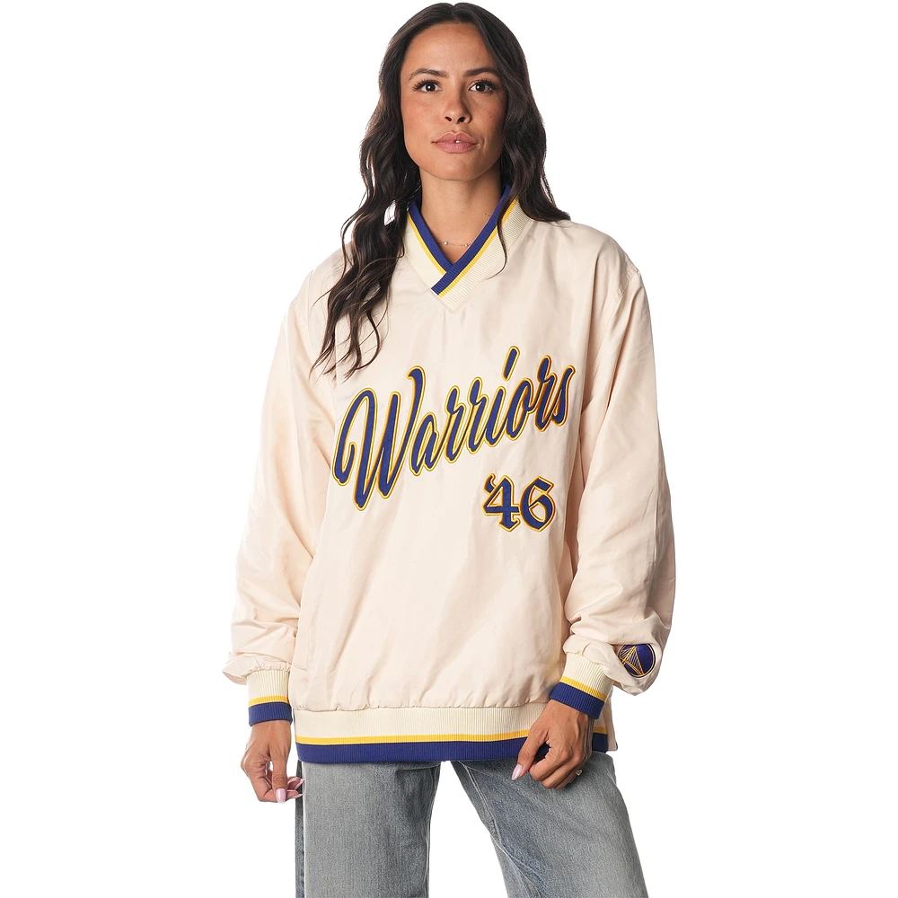 Pull coupe-vent unisexe The Wild Collective crème avec appliques Golden State Warriors