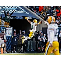 Christian Watson Green Bay Packers Unsigned Leaping for a Touchdown Photograph