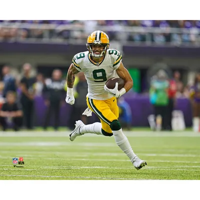 Christian Watson Green Bay Packers Unsigned Leaping for a Touchdown  Photograph