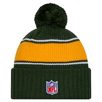 Bonnet tricoté à revers avec pompon pour homme New Era Green Bay Packers 2024 Sideline Sport