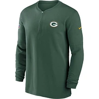 Haut Nike Green Bay Packers 2023 Sideline Performance à manches longues et quart de zip pour homme