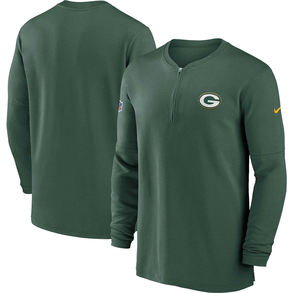 Haut Nike Green Bay Packers 2023 Sideline Performance à manches longues et quart de zip pour homme