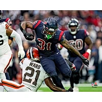 Dameon Pierce Houston Texans Unsigned Breaking a Tackle Photograph