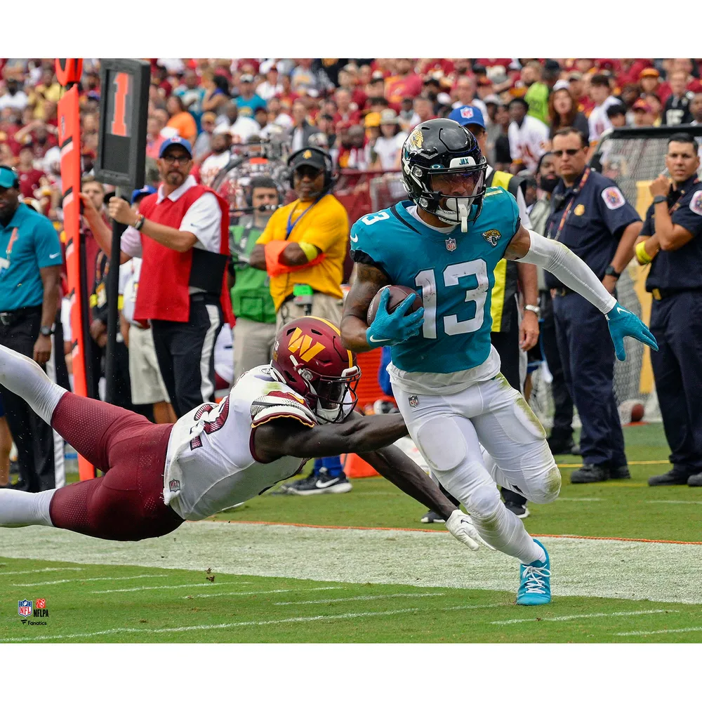 Dameon Pierce Houston Texans Unsigned Breaking a Tackle Photograph