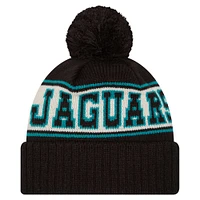 Bonnet en tricot à revers rétro Jacksonville Jaguars New Era noir pour homme avec pompon