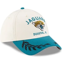 Casquette New Era 39THIRTY Flex crème/bleu sarcelle pour homme des Jaguars de Jacksonville, draft NFL 2025