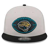 Men's New Era Stone/Black Jacksonville Jaguars 2024 Sideline Historic 9FIFTY Snapback Hat