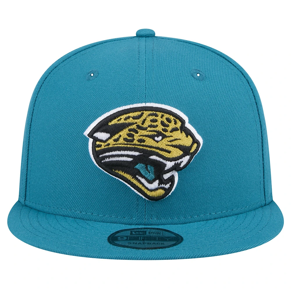 Men's New Era  Teal Jacksonville Jaguars Throwback Logo Standard 9FIFTY Snapback Hat