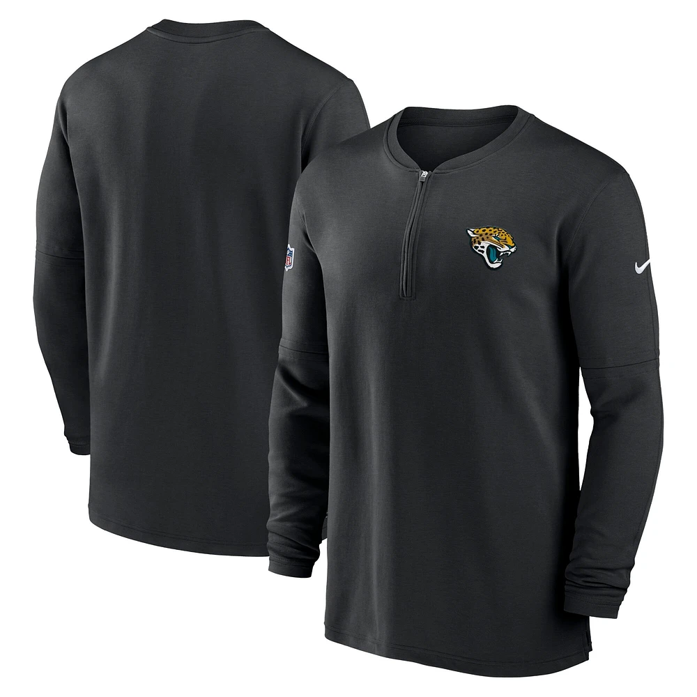 Haut à manches longues tri-mélange et quart de zip Nike noir pour homme des Jacksonville Jaguars 2023 Sideline Performance