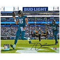 Trevor Lawrence Jacksonville Jaguars Autographed 8'' x 10'' Teal Jersey Rush Touchdown Photograph