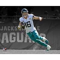 Trevor Lawrence Jacksonville Jaguars Unsigned White Jersey Spotlight Photograph