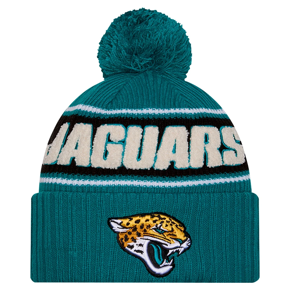 Bonnet tricoté à revers avec pompon Jacksonville Jaguars 2024/25 bleu sarcelle New Era pour jeune