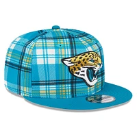 Youth New Era Teal Jacksonville Jaguars 2024 Sideline Statement 9FIFTY Snapback Hat